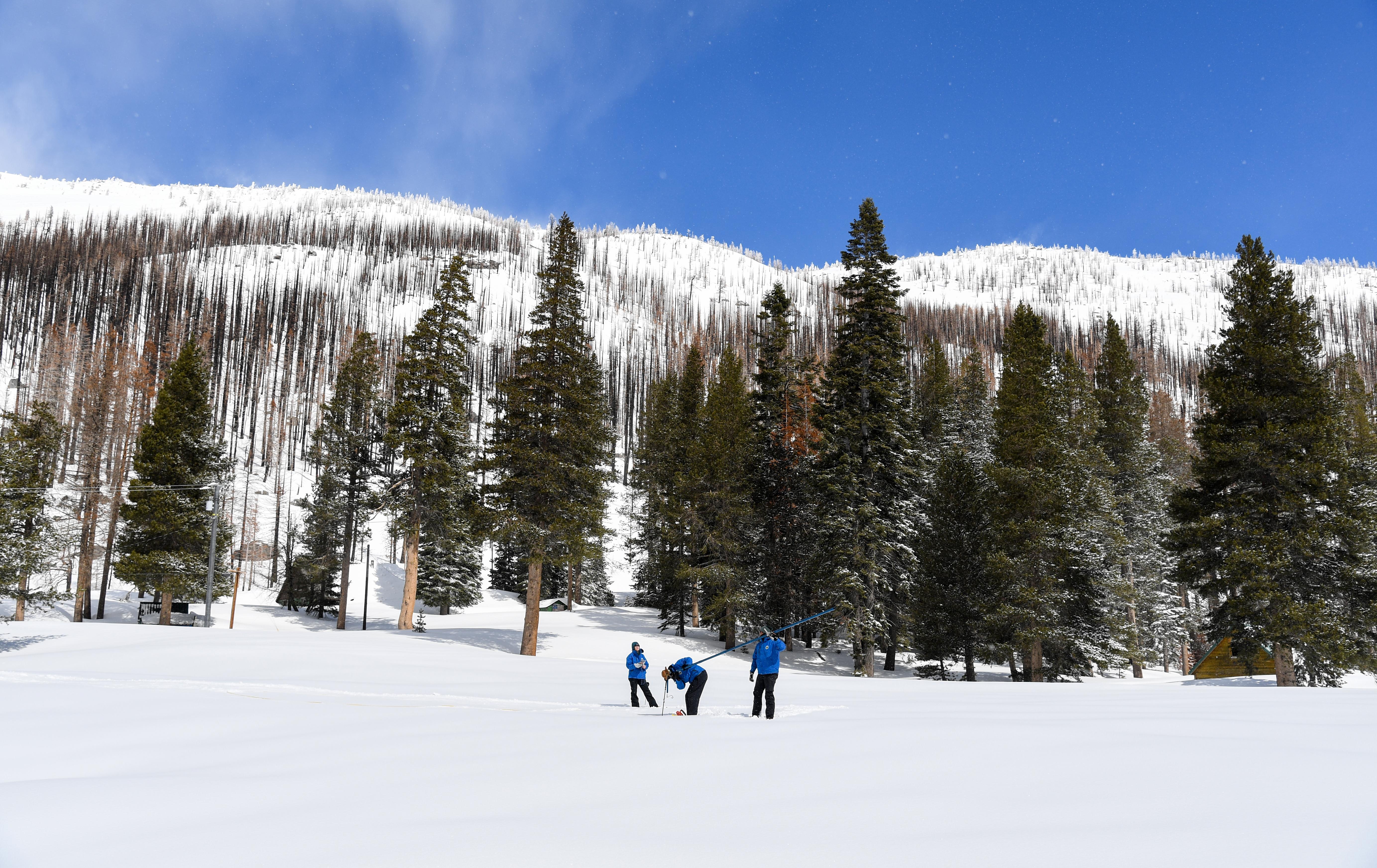 DWR staff take the April snow survey