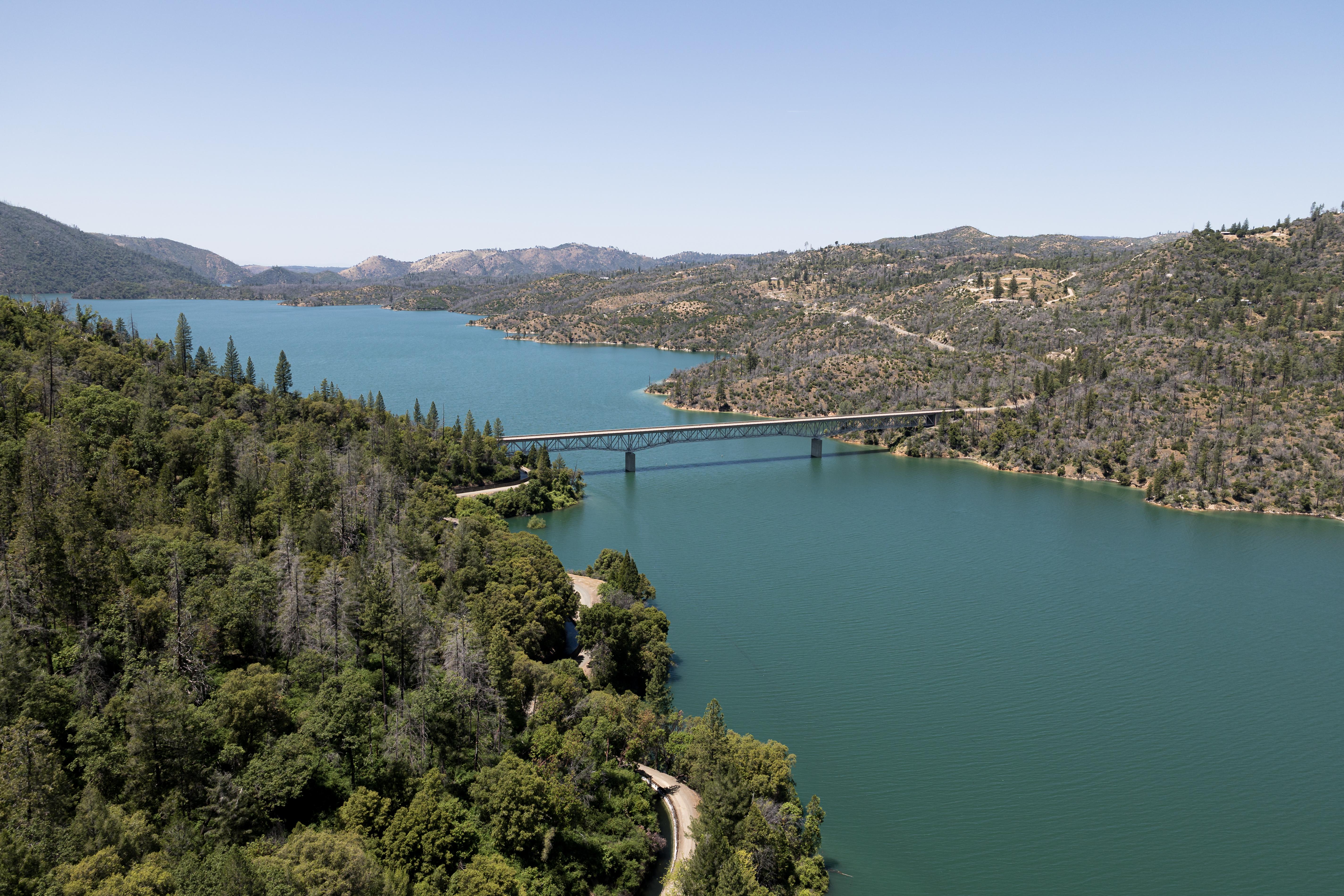 An aerial view in May 2025 shows high water conditions at Enterprise Bridge located at Lake Oroville in Butte County, California. Lake Oroville is the State Water Project’s largest reservoir. Photo courtesy of Nick Shockey / California Department of Water Resources. 