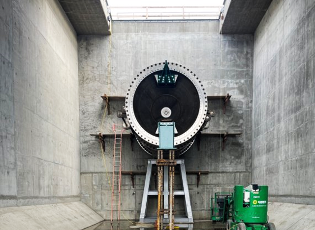 A view of one of two fixed cone valves, measuring 11 feet in diameter, located on each side of the diversion outlet structure. December 2025.