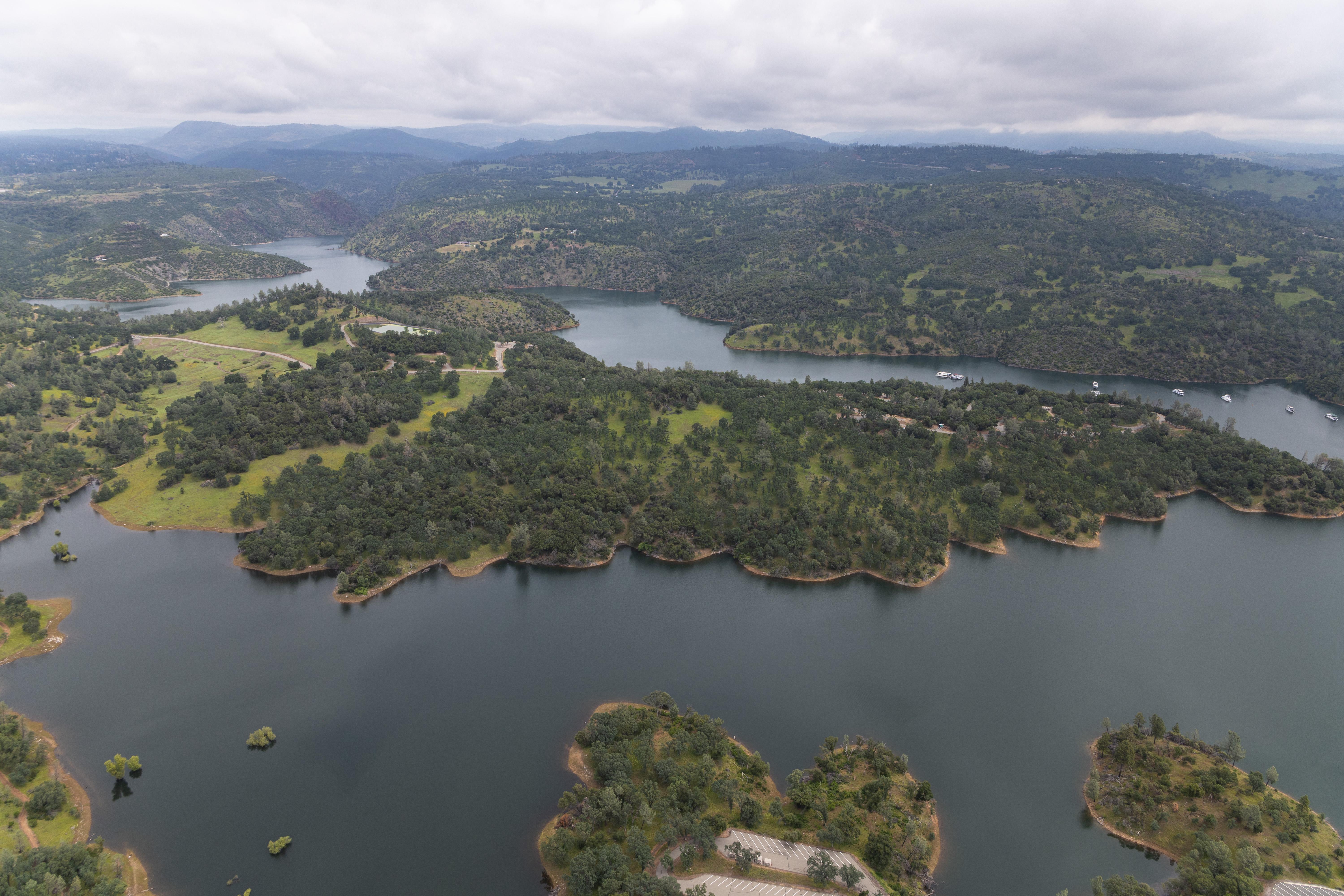 An aerial view shows high water conditions at Lime Saddle Marina located at Lake Oroville in Butte County, California on May 6, 2025. On this date, the water storage was 3,355,264 acre-feet (AF), 98% of the total capacity. Photo courtesy of Andrew Nixon / California Department of Water Resources.