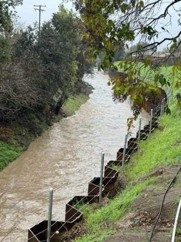Storm water safely travels downstream along improved sections of Calabazas Creek.