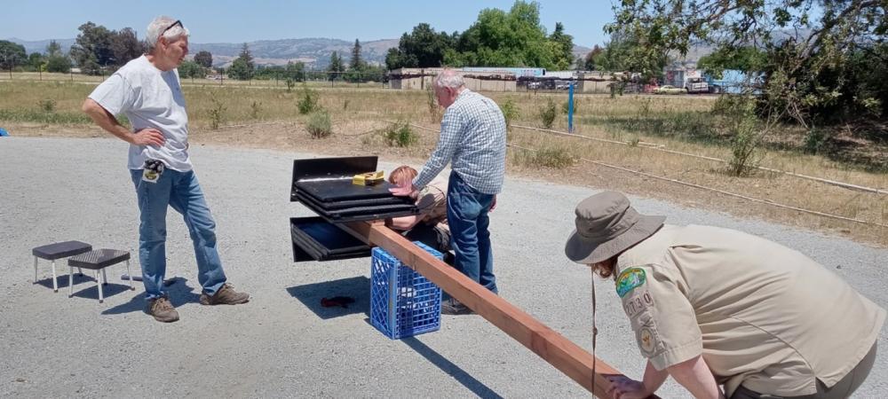 Volunteers and troops design the bat roost